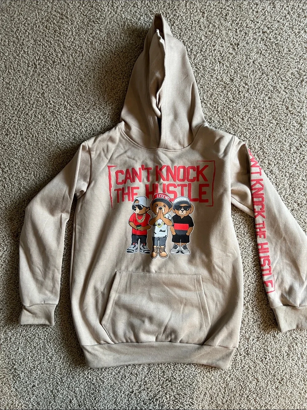 Kids Beige Hoodie with 'Can't Knock The Hustle' Graphic